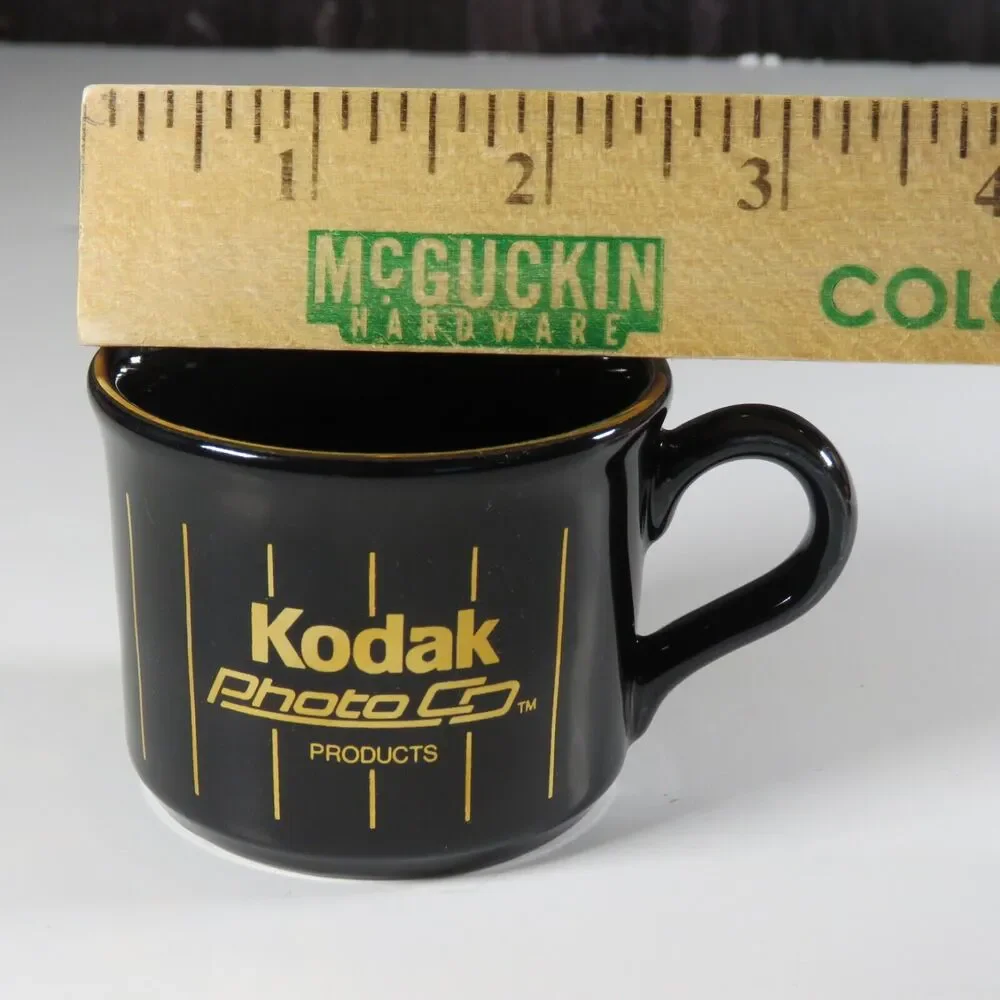 Kodak Photo Co. Paper Clip Holder Small Mug Cup Gold Black RARE Advertisement
